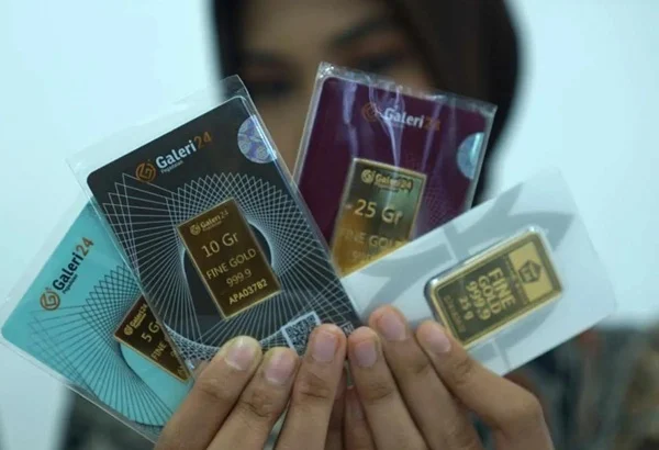 Ilustrasi emas batangan UBS dan Galeri 24 yang dijual di Pegadaian dengan harga terbaru hari ini.